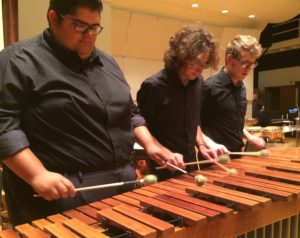 Ricardo Forester, Jacob Partida, and Lee Ginnings playing on marimba. Photo by Emily Simmons