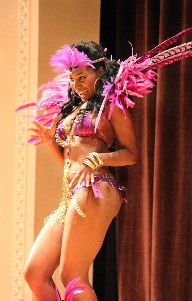 D'elle George, premed junior, displays her costume in the Costume and Personality portion during the Caribfest Pageant Wednesday night in Akin Auditorium. Pageant started 45 minutes late, but the house was still packed with more than 300 people for the show. Five contestants competed in the Miss Caribfest Pageant, with Indira Placide winning the crown. Photo by Rachel Johnson