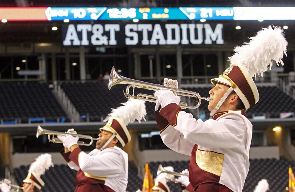Austin Coker, freshman, marches during halftime at Midwestern State University v. Eastern New Mexico game at AT&T Cowboys Stadium in Arlington, Sept. 20, 2014. Photo by Rachel Johnson
