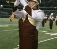 Hoss Barnes, music education junior, marches with the band at halftime at Midwestern State University v. Eastern New Mexico game at AT&T Cowboys Stadium in Arlington, Sept. 20, 2014. Photo by Rachel Johnson