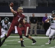 Quarterback Jake Glover, accounting senior, throws the ball at Midwestern State University v. Eastern New Mexico game at AT&T Cowboys Stadium in Arlington, Sept. 20, 2014. Photo by Lauren Roberts
