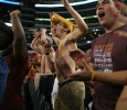 Brandon Allen, mechanical engineering sophomore, cheers with members of the stang gang at Midwestern State University v. Eastern New Mexico game at AT&T Cowboys Stadium in Arlington, Sept. 20, 2014. Photo by Rachel Johnson
