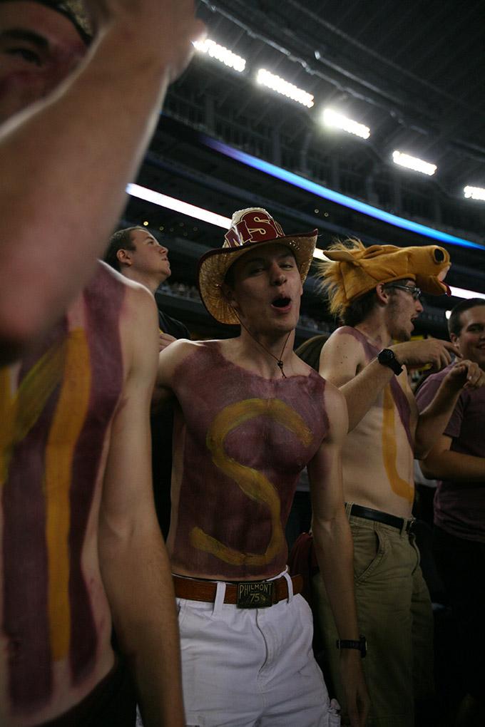 Coleman Reidling, history sophomore, cheers with the stang gang at Midwestern State University v. Eastern New Mexico game at AT&T Cowboys Stadium in Arlington, Sept. 20, 2014. Photo by Rachel Johnson