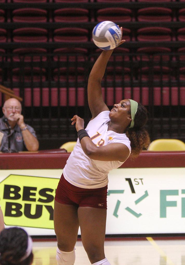Bailee Larkin-McDowell, nursing freshman, hits the ball over the net at D.L. Ligon Coliseum Saturday afternoon against Angelo State. MSU lost 1-3. Photo by Lauren Roberts