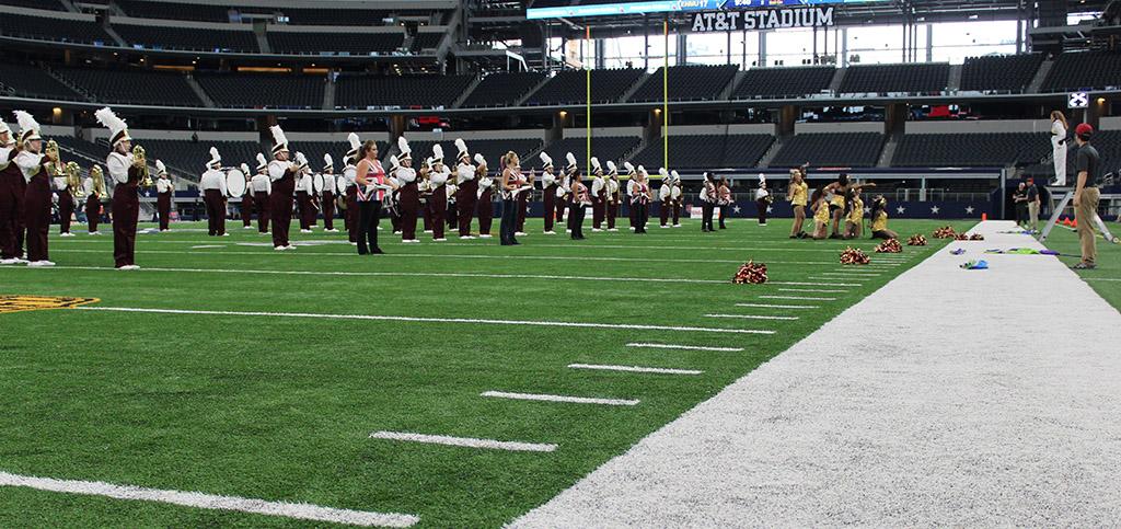 The Golden Thunder Marching Band, Goldettes, and MSU Colorguard end the second performance of their half time show, moving onto the Fight Song as their last performance in the AT&T Stadium, Sept, 19. MSU played Eastern New Mexico University Photo by Rachel Johnson