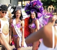 Larissia Gumbs, psychology sophomore, Jorrey Martin, special education sophomore, and Joslyn Le Blanc, biology sophomore, get a picture taken of them during the beginning of the 2015 CaribFest Parade. Sept. 25. Photo by Francisco Martinez
