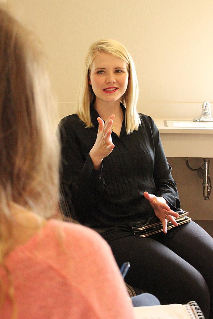 Morgan Haire, mass communication sophomore, interviews Elizabeth Smart backstage in the dressing room about her goals that she hopes to attain by speaking tonight at the lecture series. Photo by Rachel Johnson