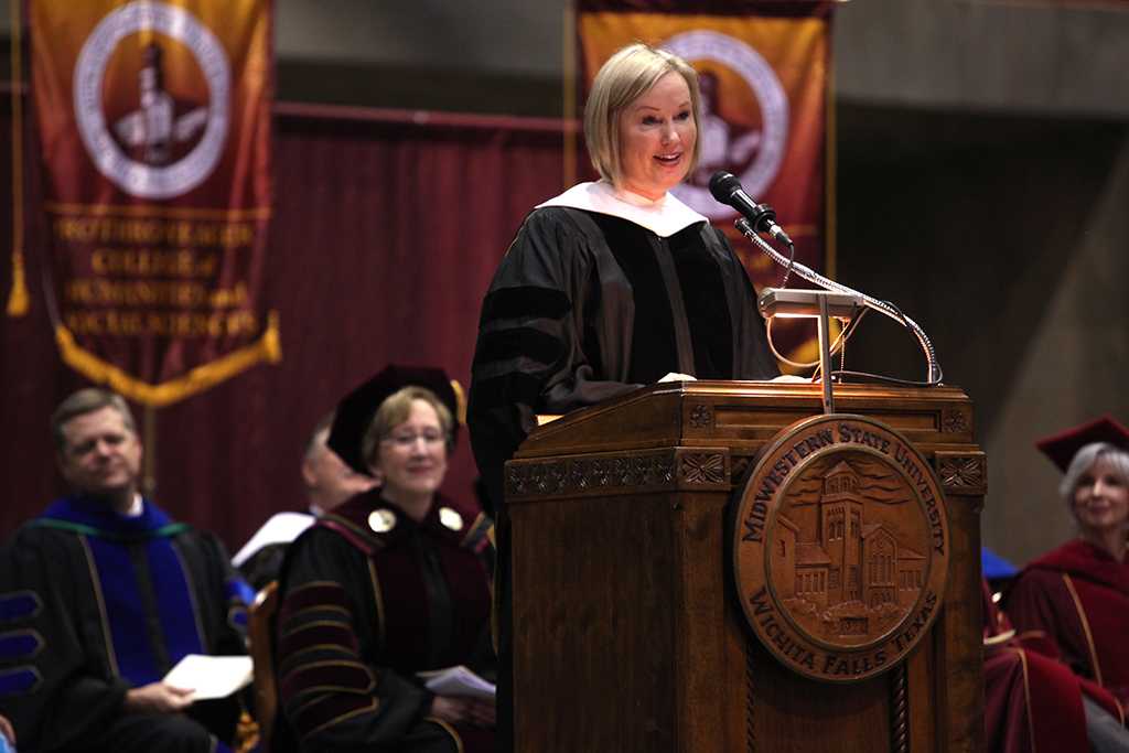 Catherine Davis, MSU Alumna, gives advise to the graduates in the Commencement Ceremony in Kay Yeager Coliseum Dec. 12, 2015. Photo by Francisco Martinez