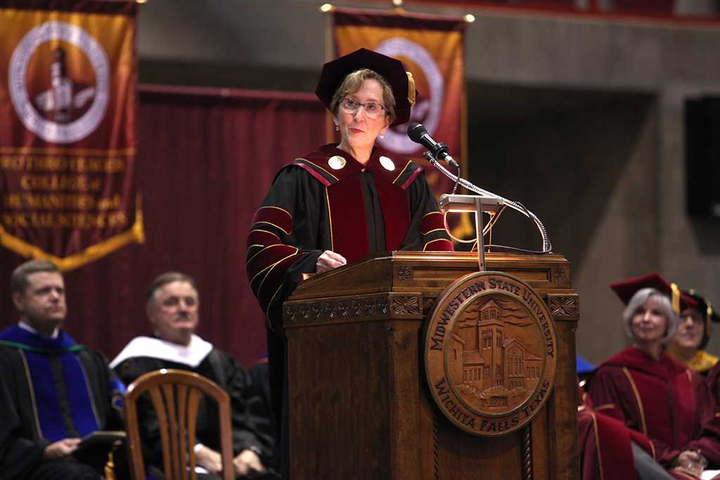 Suzanne Shipley, university president, welcomes the graduates and audience members at the Commemcement Ceremony in Kay Yeager Coliseum Dec. 12, 2015. Photo by Francisco Martinez