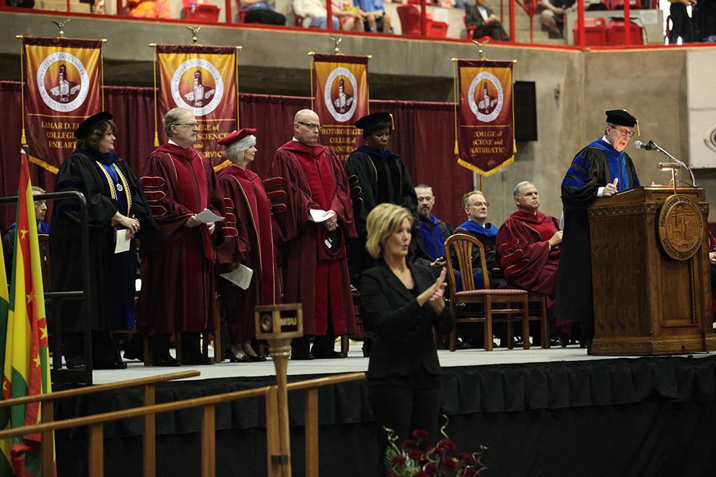 Retiring university president Jesse Rogers welcomes people to the Midwestern State University graduation, May 16, 2015 at the Kay Yeager Coliseum.