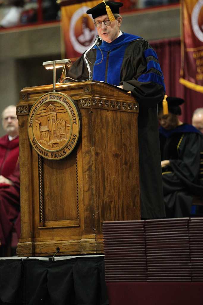 Retiring University President Jesse Rogers delivers the commencment address at Midwestern State University graduation, May 16, 2015 at the Kay Yeager Coliseum.