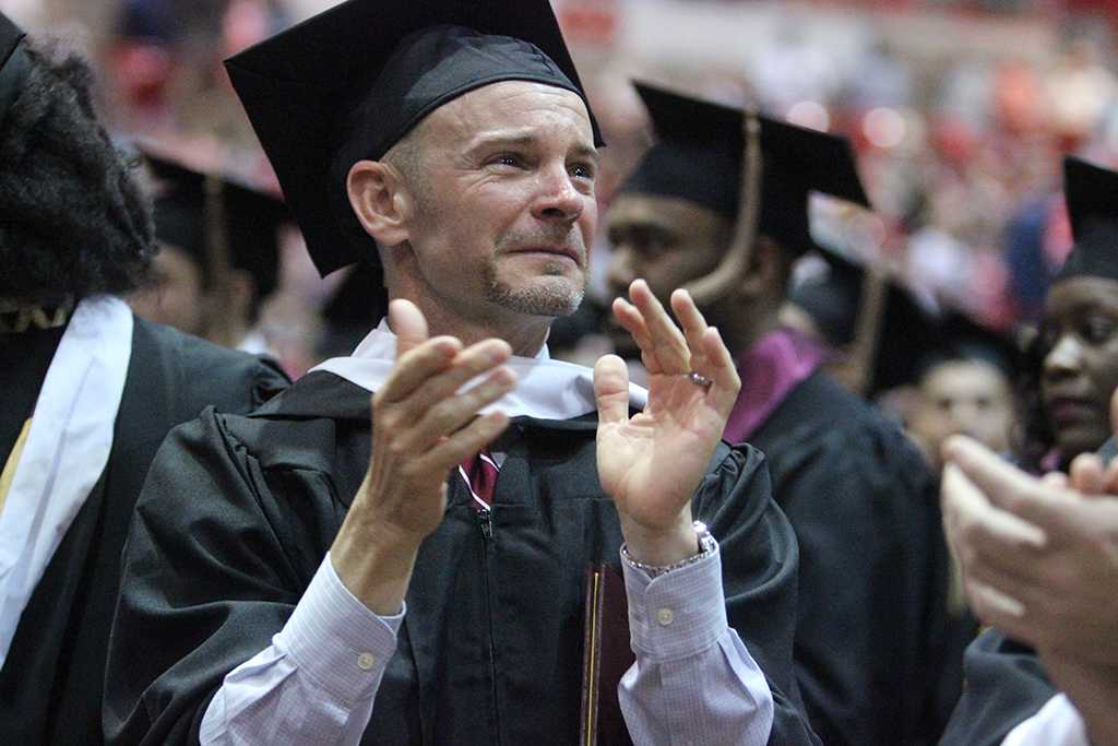 David Owens, history, gets teary eyed during the part in the ceremony when the students applaud those who have encouraged them and supported them at Midwestern State University graduation, May 16, 2015 at the Kay Yeager Coliseum. Photo by Rachel Johnson