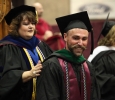Robin Goodfellowe, science and mathematics senior, receives his masters hood at Midwestern State University graduation, May 16, 2015 at the Kay Yeager Coliseum. Photo by Francisco Martinez