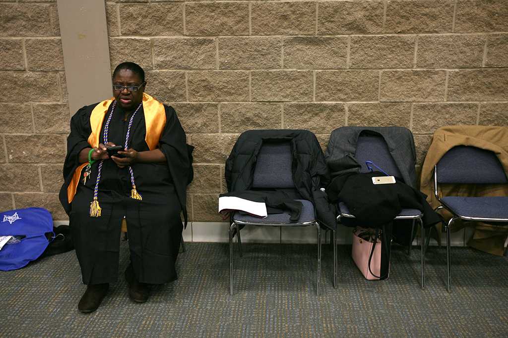 Shirley Phillips relaxes before getting in line for the processional. Photo by Bradley Wilson