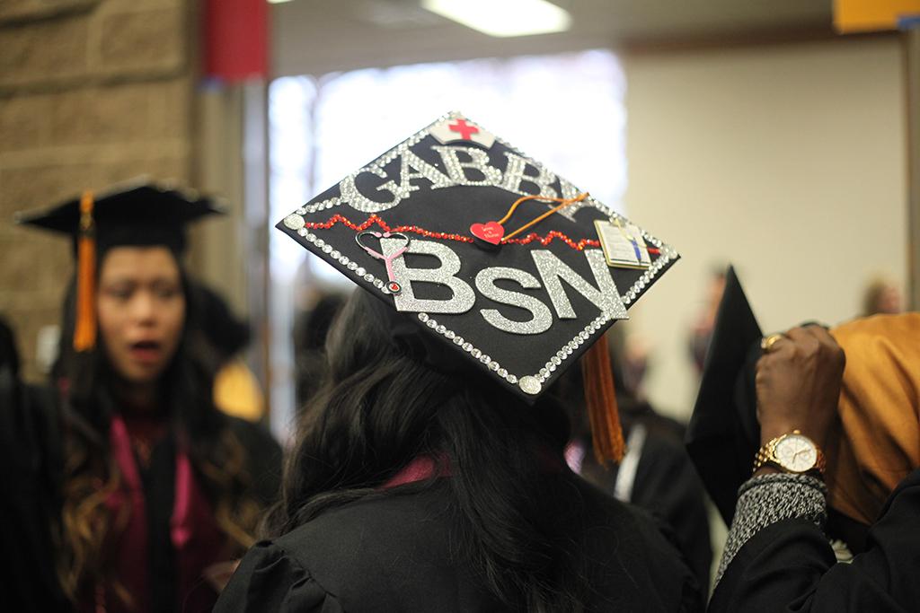 Gabriela Ruiz, nursing graduate, said, "[The reason she decorated her cap was] I wanted to stand out." Photo by Jeanette Perry.