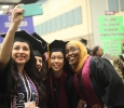Nursing graduates, Christine Aranda, Kaitlyn Hofbauer, Dana Chu and Lula Nur, pose for a selfie at the Midwestern State University graduation, Fall 2016. Photo by Jeanette Perry.