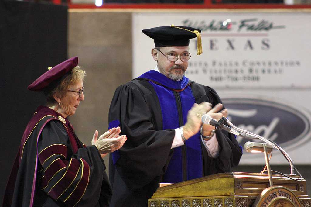 Suzanne Shipley, university president, and James Johnston, provost and vice president for academic affairs,congradulate the graduates for completeing the required courses for their degrees at the fall 2017 commencement at the Kay Yeager Colliseum on Sat. Dec. 16, 2017. Photo by Justin Marquart