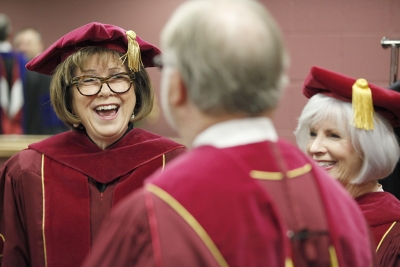 Nancy Marks, board of regents member, and Shelley Sweatt, board of regents member, prepare for MSU's commencement ceremony at Kay Yeager Coliseum. Saturday Dec. 16, 2017. Photo by Francisco Martinez