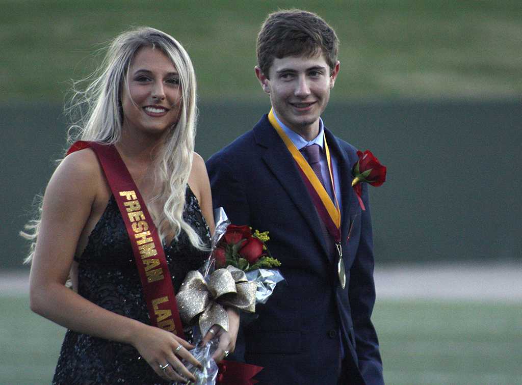 Kaylee Rhine, nursing freshman, and Kale Hutchins, general business freshman, the Lady and Lords of the homecoming court on the field during halftime of the homecoming game against West Texas where the Mustangs won 45-3 at Memorial stadium on Saturday, Oct. 21, 2017. Photo by Justin Marquart