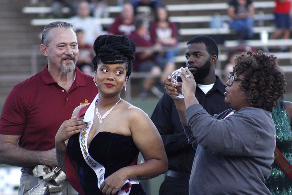 Jaylon Williams, sociology senior, crowned queen during halftime of the homecoming game against West Texas where the Mustangs won 45-3 at Memorial stadium on Saturday, Oct. 21, 2017. Photo by Justin Marquart
