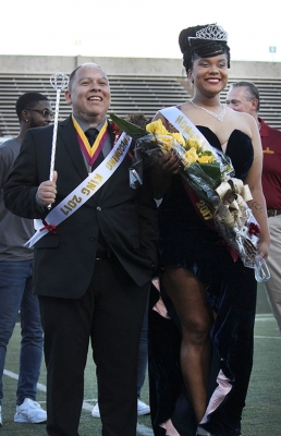 Jaylon Williams, sociology senior, and Juan Mercado, sociology senior, stand posing for photos after being announced 2017 Homecoming King and Queen during halftime Saturday, Oct. 21, 2017. Photo by Rachel Johnson