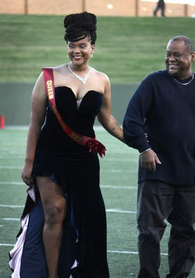 Jaylon Williams, sociology senior, hears her name called for the 2017 Homecoming Queen title during Halftime at Memorial Stadium, Saturday Oct. 21, 2017. Photo by Rachel Johnson