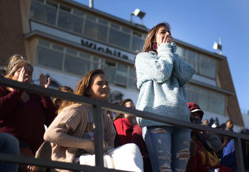 Alex BLake, finance senior, puts her hands to her face after an MSU player was tackled making his way down the field during the Round One NCAA II Playoff game against University of Sioux Falls at Memorial Stadium, Saturday Nov. 18, 2017. Photo by Rachel Johnson