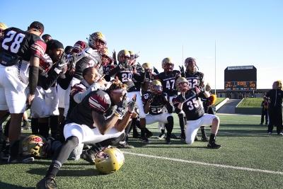 The MSU Football poses for pictures after the end of the NCAA II Round One Playoffs Game where MSU beat University of Sioux Falls 24-20, pushing MSU to Round Two of playoffs against Minnesota State. Photo by Rachel Johnson