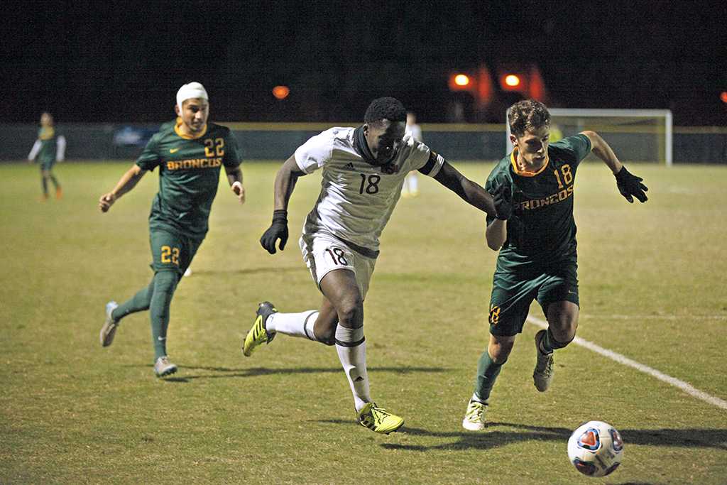 Defender and finance junior Koby Sapon-Amoah attempts a shot at goals against Cal Poly Pomona in the NCAA Division II Championship playoff. Nov 18. Photo by Bridget Reilly