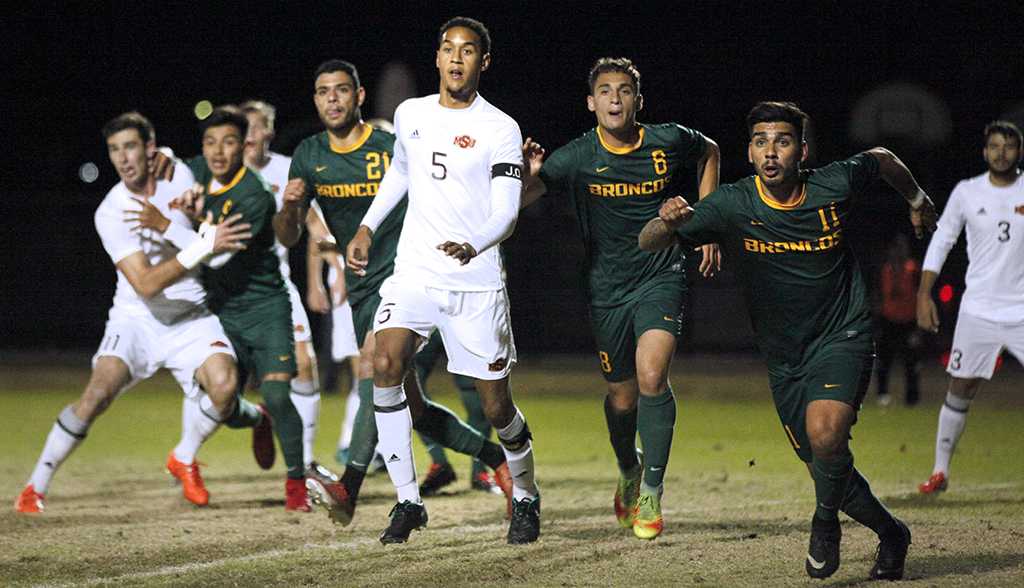 Defender and business senior Jordan Speed chases a corner kick by Cal Poly Pomona, in the NCAA Division II Championship playoff. Nov 18. Photo by Bridget Reilly