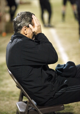 Head coach Doug Elder takes a moment to gather himself after Cal Poly Pomona matches the score to 2-2 in the second half of the NCAA Divison II Championship playoff. Nov 18. Photo by Bridget Reilly