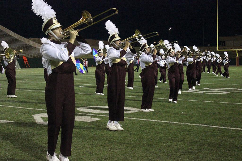 The Golden Thunder Band does a special tribute to the band Queen as their second preformance in their first halftime show of the season at Memorial Stadium, Sept. 5. Photo by Rachel Johnson