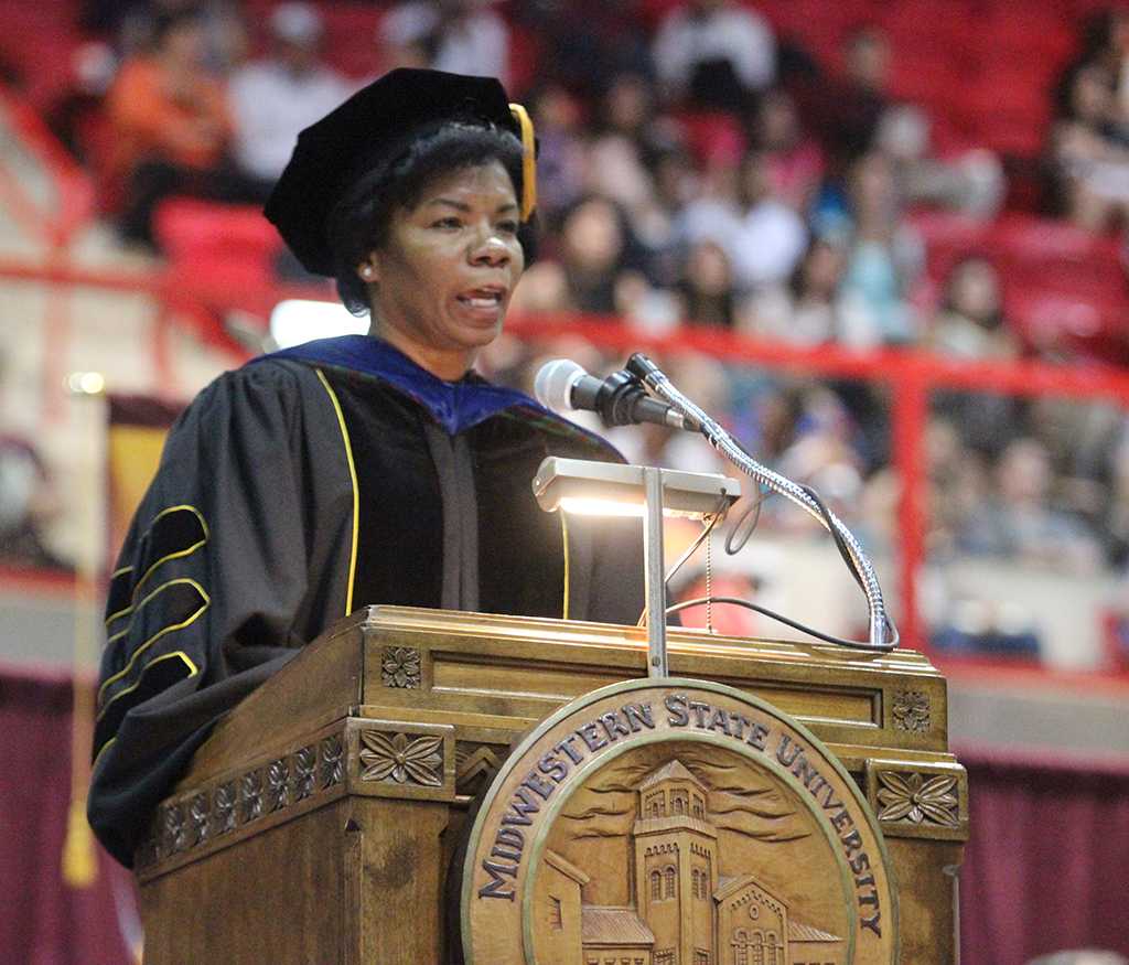 Betty Stewart, provost, introduces the guest speaker at Midwestern State University graduation, May 16, 2015 at the Kay Yeager Coliseum. Photo by Rachel Johnson