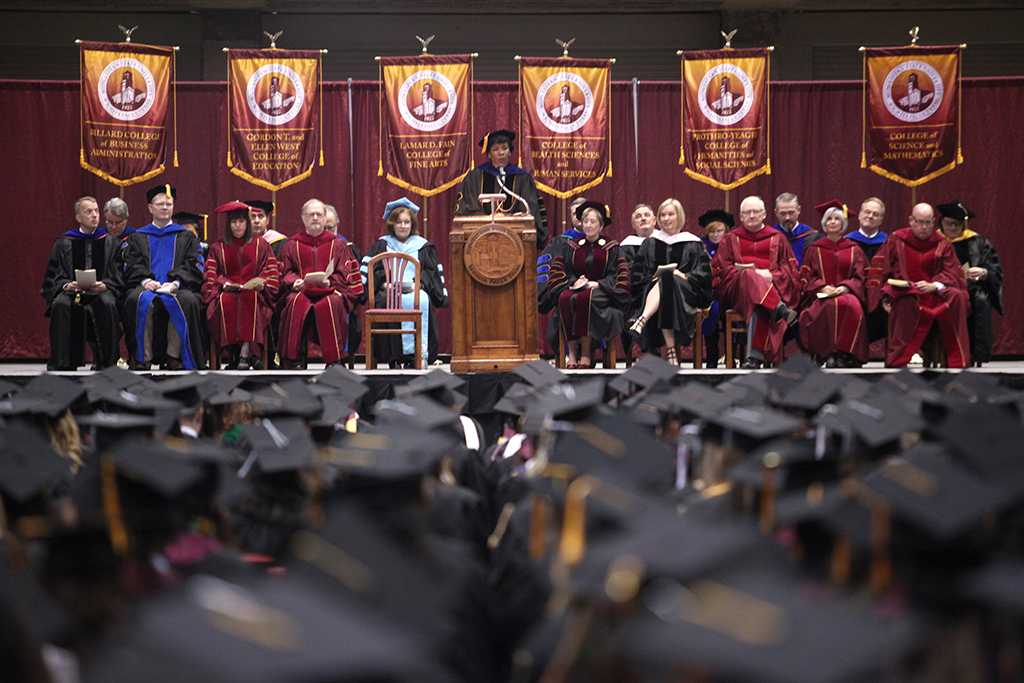 Betty Stewart, provost and vise president for academic affairs, congratulates the graduates and their family at the Commencement Ceremony in Kay Yeager Coliseum Dec. 12, 2015. Photo by Francisco Martinez