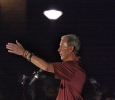 Bill Maskill, head football coach, speaks at the candle light vigil in honor of Robert Grays, , on the Jesse Rogers Promenade on Sept. 21. Photo by Justin Marquart