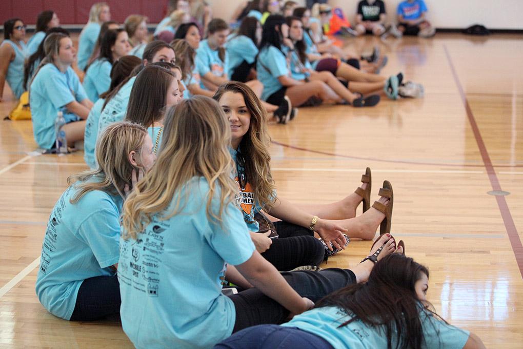 Chi-Omegas sit on the sideline of the Championship game at the Chi-Omega Basketball Tournament, Swishes for Wishes, where The Fab 5 beat The Sticky Bandits 27-20, Saturday, March 28, 2015. Photo by Rachel Johnson