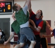 Bradley Anderle, Lawyer, goes up for a layup and make it as his teammate, Cody Anderle, engineer, blocks a member of the opposing team during the Chi-Omega Basketball Tournament, Swishes for Wishes, Sat. March 28, 2015. Photo by Rachel Johnson
