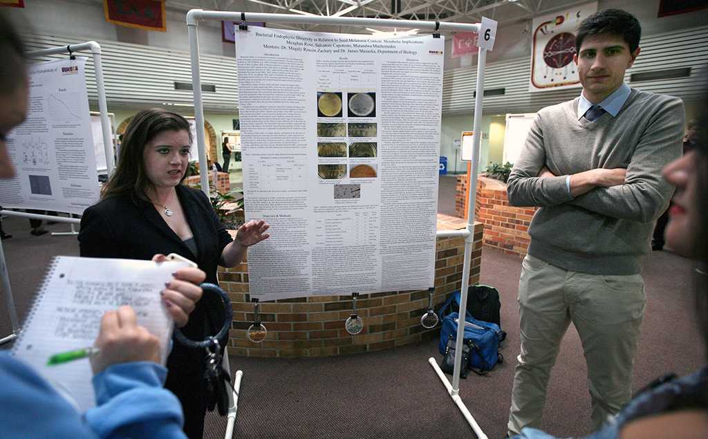 Meaghan Rose, biology senior, and Salvator Capotosto, biology senior, present their research on bacterial endophytic diversity during EUREKA on April 27. Photo by Arianna Davis