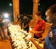 Members of the Caribbean Student Organization prepare candles outside of Bolin Hall Sept. 1. Photo by Francisco Martinez
