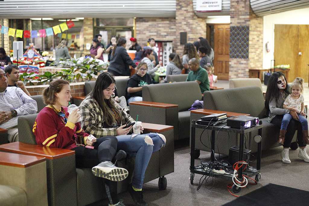 MSU students and guest sit down watching The Book of Life movie during the Dia de los Muertos event held by multiple organizations in the Atrium, Wednesday, Nov. 1, 2017. Photo by Francisco Martinez
