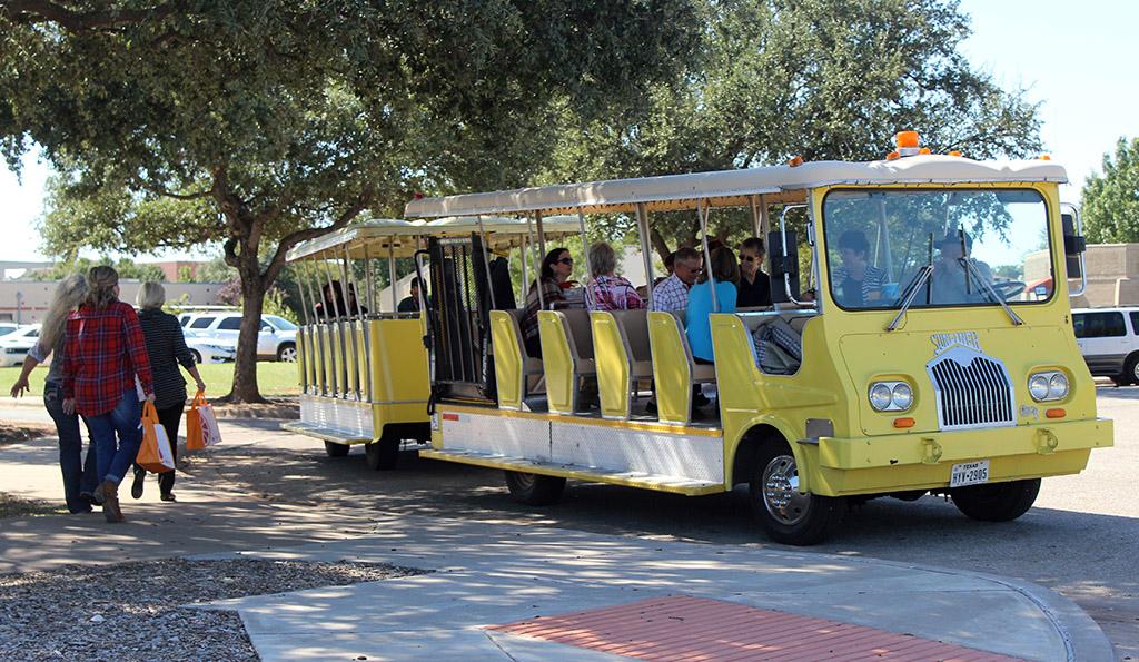 Attendees of the Empty Bowls Event get on the trolly after visiting the Wichita Falls Museum of Art at MSU to take them back to their parked cars, Oct. 10. Photo by Francisco Martinez