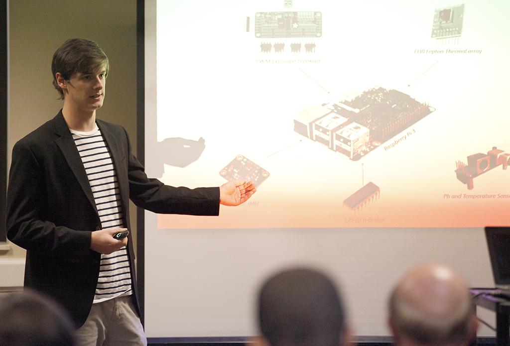 Ryan Fidlar, engineering senior, explains the components of the Raspberry Pi 3 and what is can measure  during the Undergraduate Research and Creative Activity Forum in the Clark Student Center, Thursday, Nov. 16, 2017. Photo by Francisco Martinez