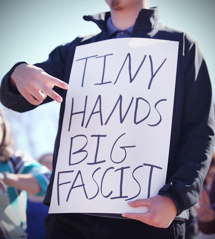 A students poster at the rally against the immigration executive order, on Feb. 1st. Photo by Bridget Reilly