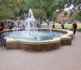 People walk around and sit near the Bolin Fountain, talking with friends and family or waiting to go to the next activity on Family Day, Sept. 26. Photo by Francisco Martinez