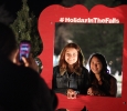 Kasey Chin, dental hygiene freshman, and Samantha Flores, psychology freshman, have thier picture taken at the MSU-Burns Fantasy of Lights opening ceremony Monday night in the front lawn of the Harden Administration building. The fantasy of lights has individual displays with themes or characters from children's stories, fairy tales and holiday themes. The fantasy of lights display opened early this year before Thanksgiving and will continue through Dec. 28. The lights turn on at dusk and turn off at 10 p.m. Sunday through Thursday and 11 p.m. Friday and Saturday. Photo by Lauren Roberts
