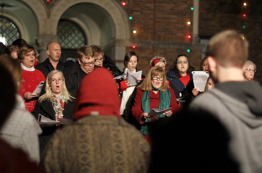 A choir sings christmas chorals at the MSU-Burns Fantasy of Lights opening ceremony Monday night in the front lawn of the Harden Administration building. The fantasy of lights has individual displays with themes or characters from children's stories, fairy tales and holiday themes. The fantasy of lights display opened early this year before Thanksgiving and will continue through Dec. 28. The lights turn on at dusk and turn off at 10 p.m. Sunday through Thursday and 11 p.m. Friday and Saturday. Photo by Lauren Roberts