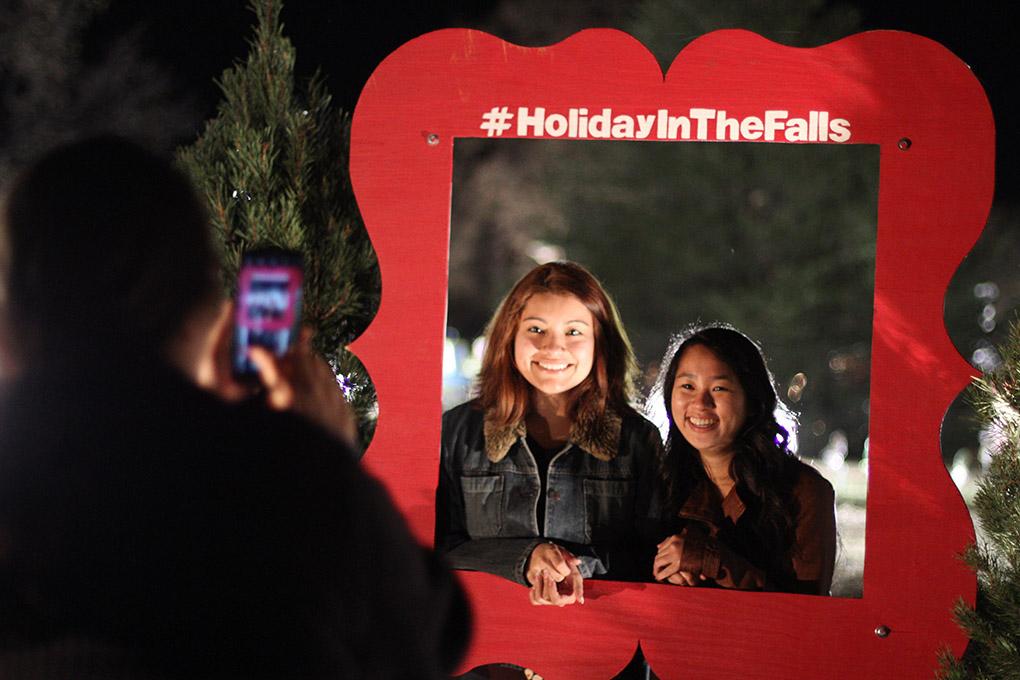 Kasey Chin, dental hygiene freshman, and Samantha Flores, psychology freshman, have thier picture taken at the MSU-Burns Fantasy of Lights opening ceremony Monday night in the front lawn of the Harden Administration building. The fantasy of lights has individual displays with themes or characters from children's stories, fairy tales and holiday themes. The fantasy of lights display opened early this year before Thanksgiving and will continue through Dec. 28. The lights turn on at dusk and turn off at 10 p.m. Sunday through Thursday and 11 p.m. Friday and Saturday. Photo by Lauren Roberts