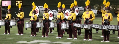 The percussion section into formation, performing "Changing Channels." Photo by Marissa Daley