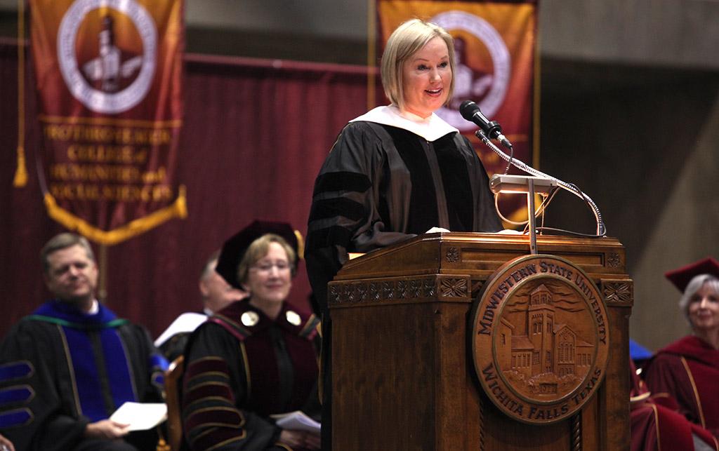 Catherine Davis, MSU Alumna, gives advise to the graduates in the Commencement Ceremony in Kay Yeager Coliseum Dec. 12, 2015. Photo by Francisco Martinez