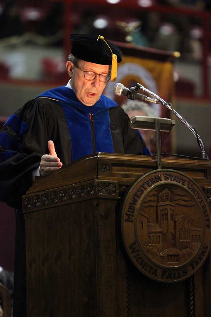Jesse Rodgers, university president, welcomes people to at Midwestern State University fall graduation, Dec. 13, 2014 in Wichita Falls, Texas. Photo by Rachel Johnson